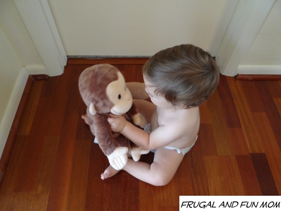 Baby with Curious George Kohl's Cares Doll