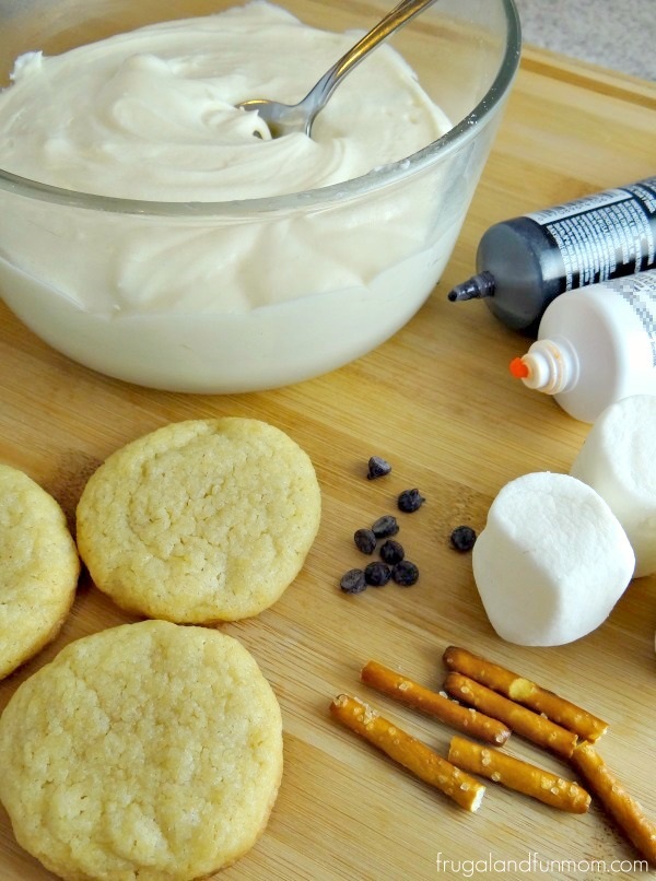 Assembling the Melting Snowman Sugar Cookies