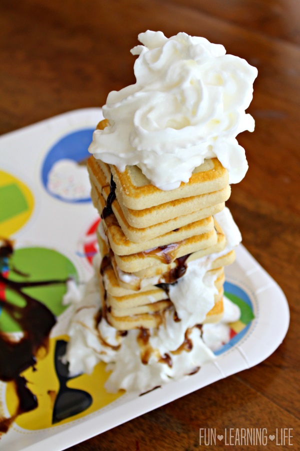 Completed cookie tower with Pepperidge Farms Chessmen cookies, Smucker’s Simple Delight toppings and Reddi-wip