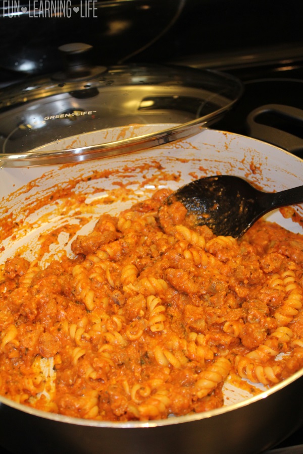 Eggplant Parmesan with Rotini Pasta cooking in a pan