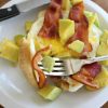 Bacon Egg and Avocado Open Faced Breakfast Sandwich on Fork
