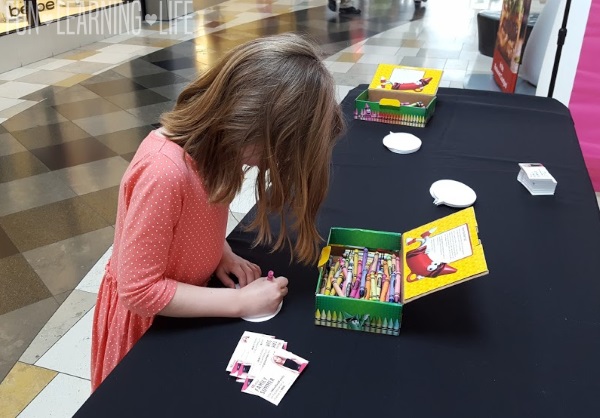 Filling out her dream card at the Barbie Event