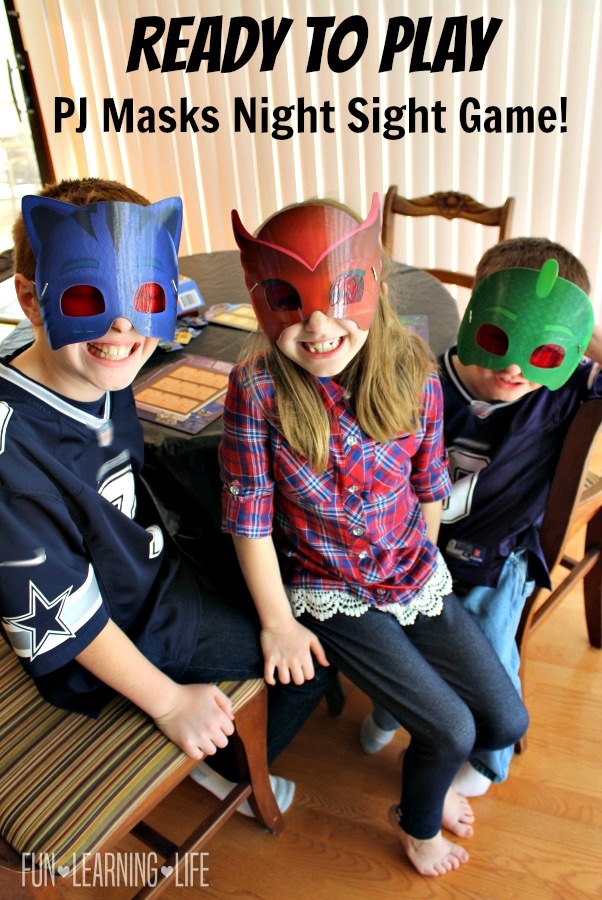 kids-wearing-masks-to-play-pj-masks-night-sight-game-from-wonder-forge
