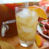 Peach-Tea-Punch-poured-over-ice